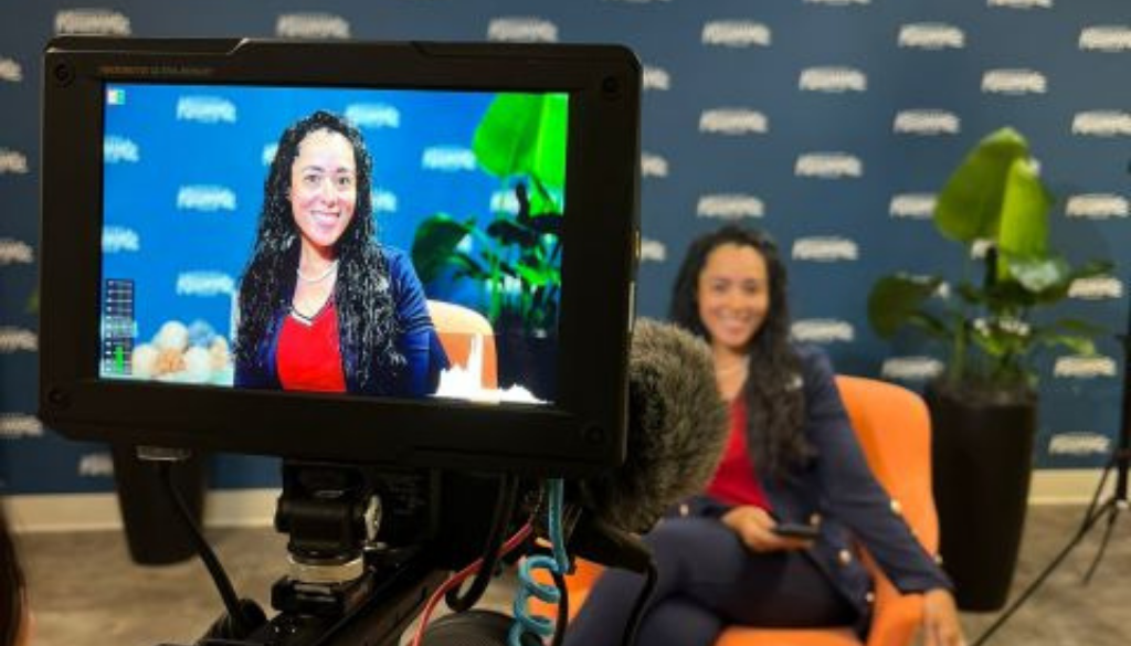 Christina Colon-Rodriguez at Telemundo Orlando interview in partnership with Experience Kissimmee for this behind the scenes image.